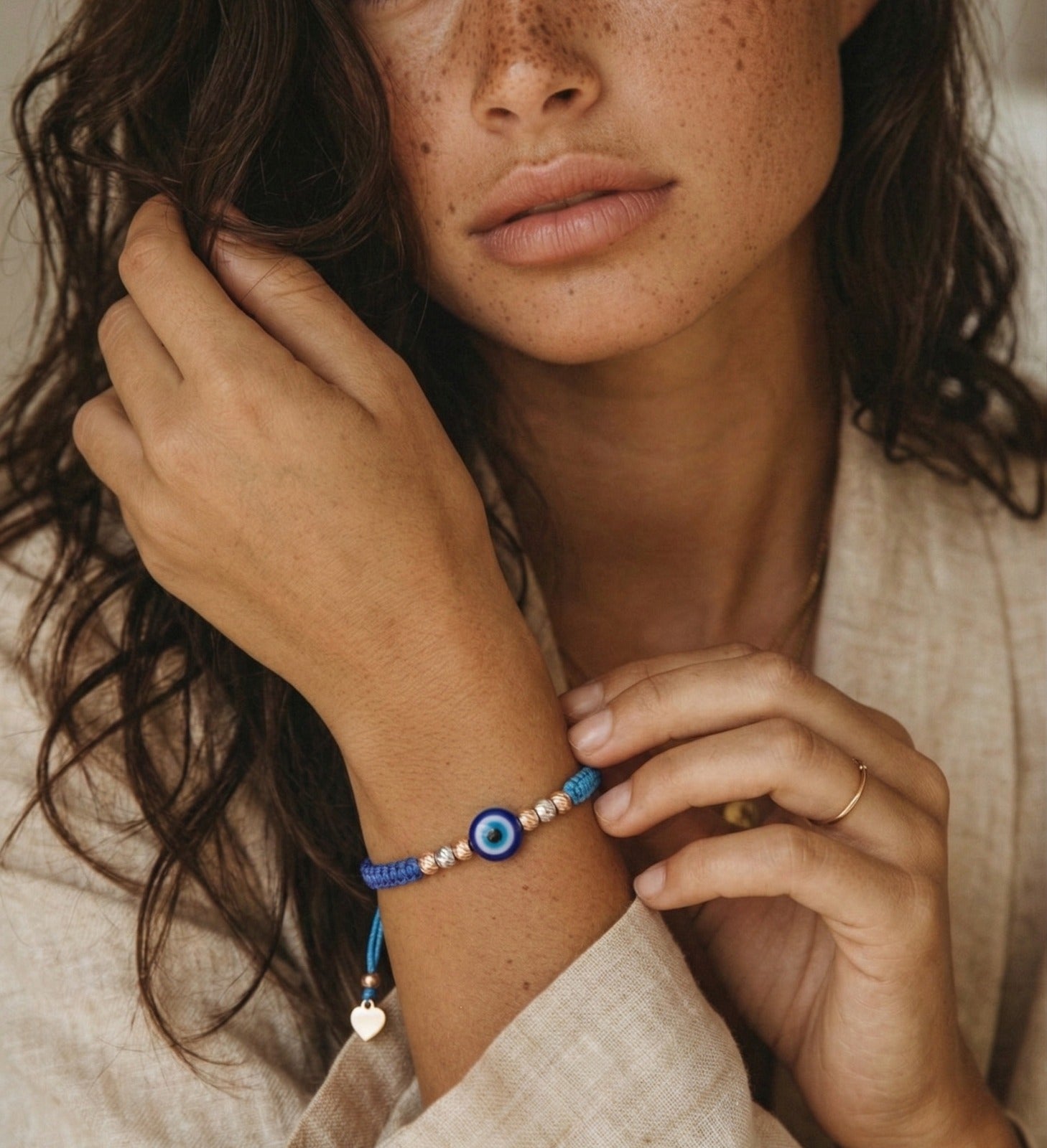 18K Gold beads and Evil Eye Charm Blue Braided Bracelet